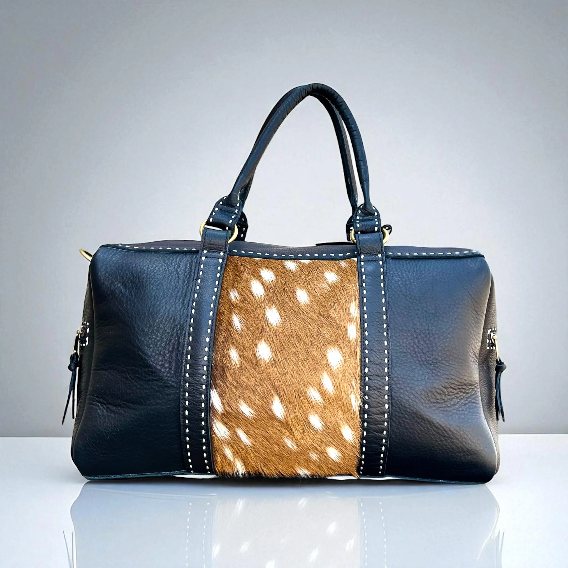 Jan axis hide duffle bag