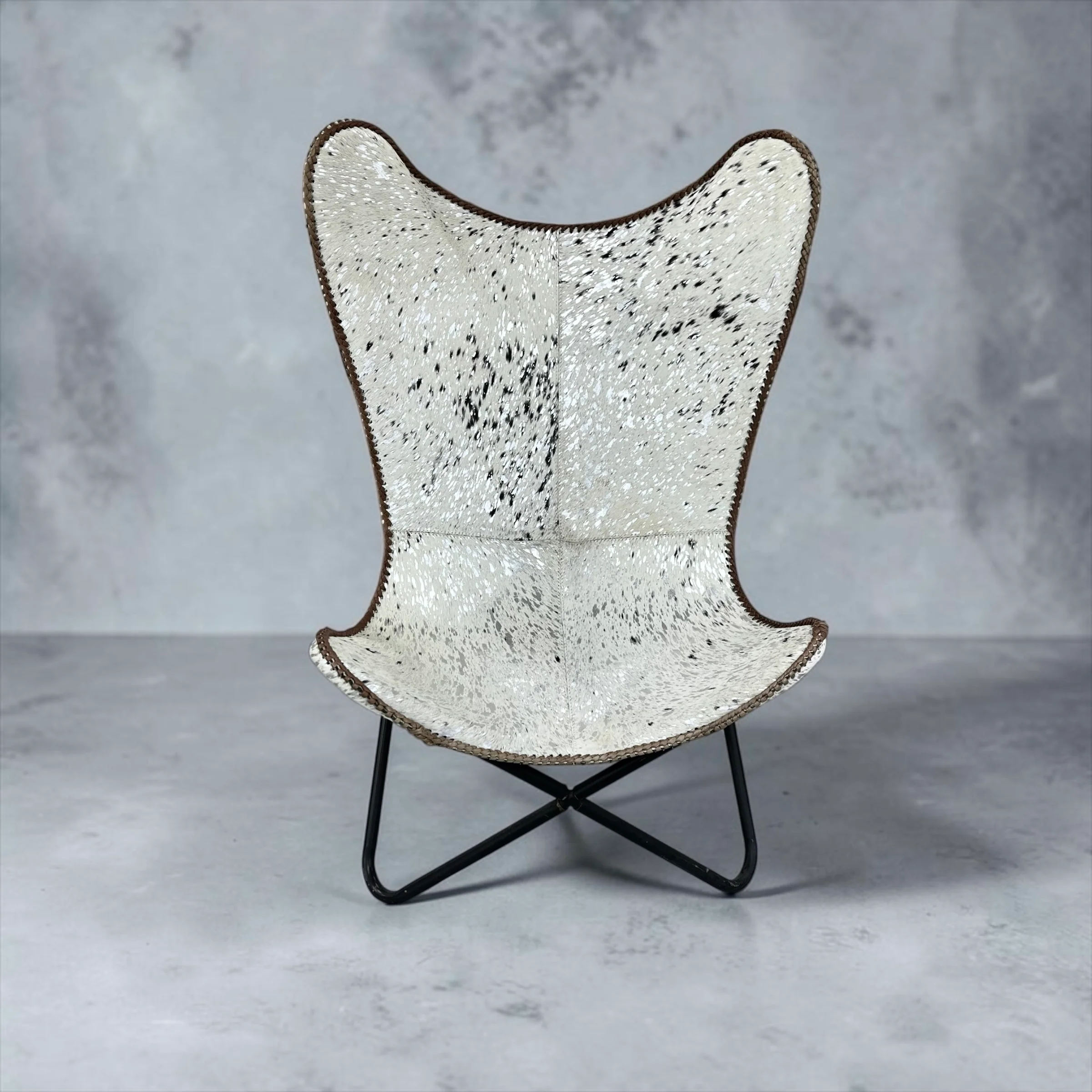 Silver acid wash cowhide butterfly chair