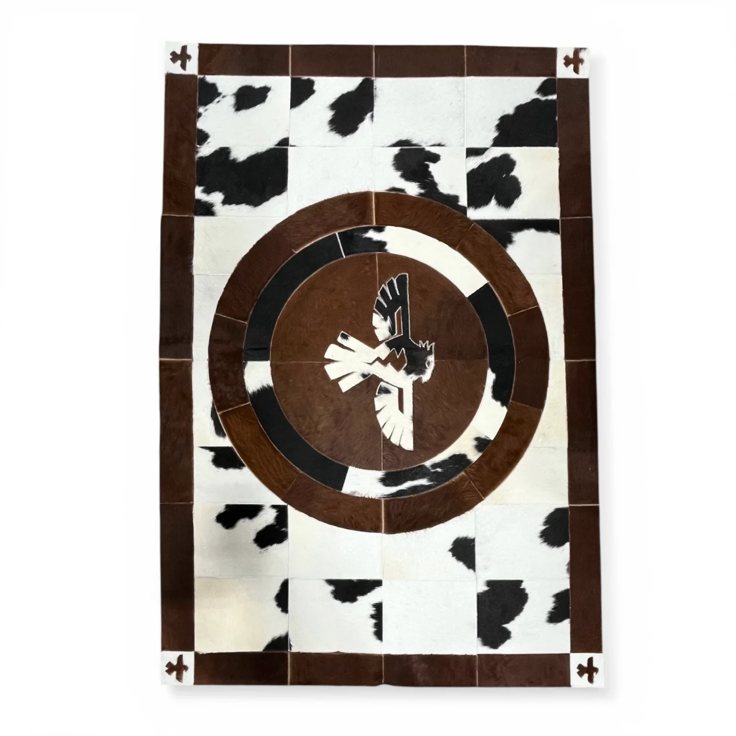 Thunderbird cowhide patchwork rug 4x6’